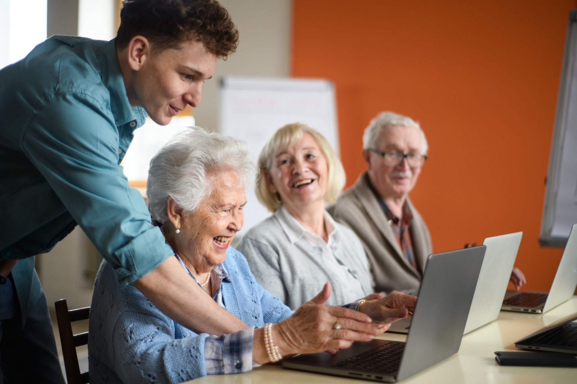 Business representatives providing compassionate service to seniors.